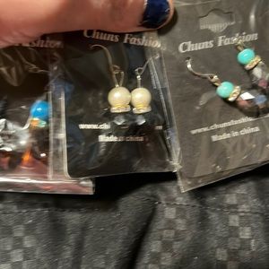 Assorted dangle earrings. Rhinestone accents